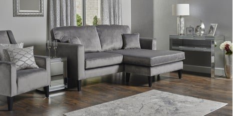 a living room with modern décor in neutral colours.