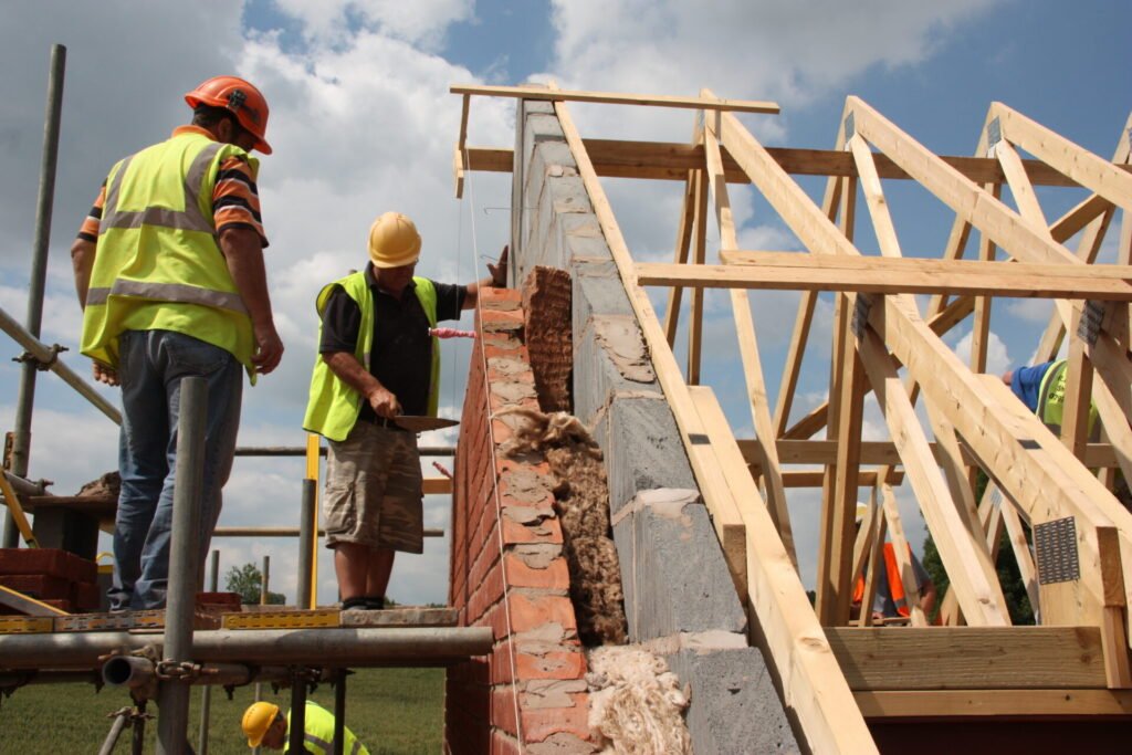 Men constructing a roof