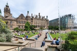 students enjoying the sun in Sheffield city centre